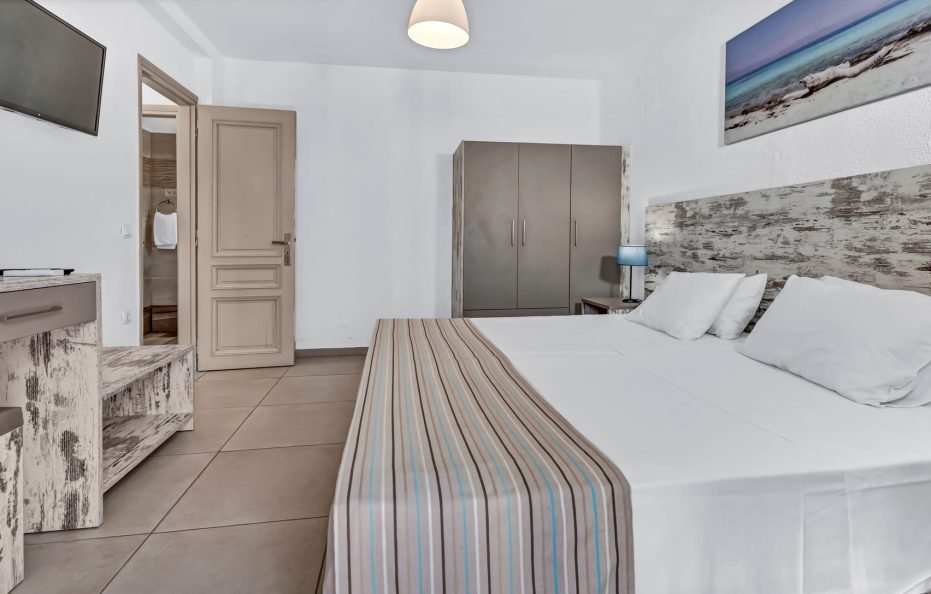 Junior Suite (Triple) Bedroom & Living Room