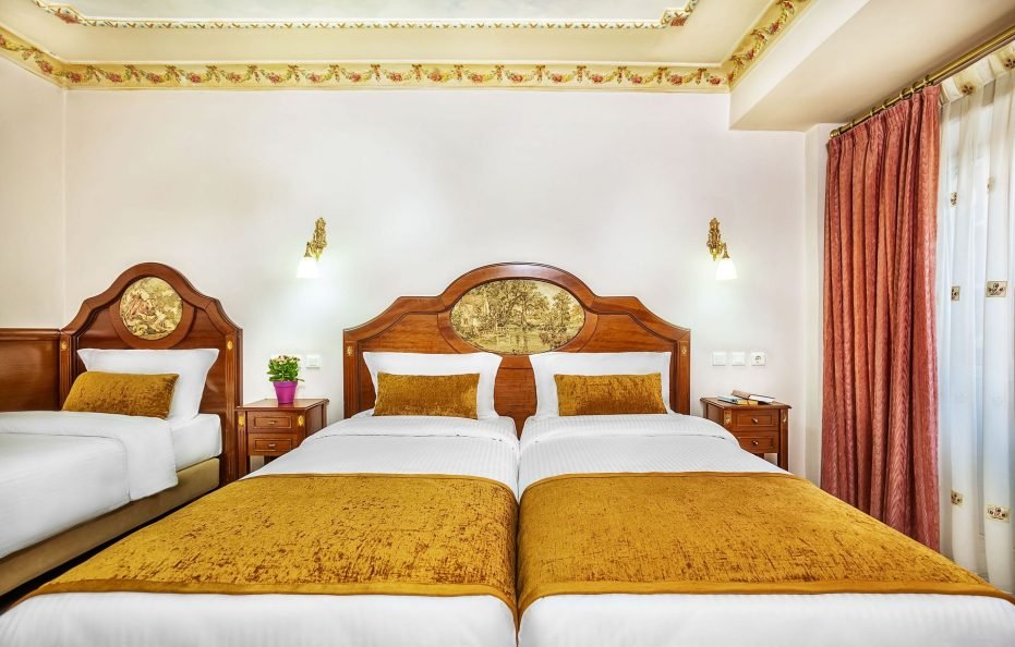 Standard Triple (King+Single Bed) City View